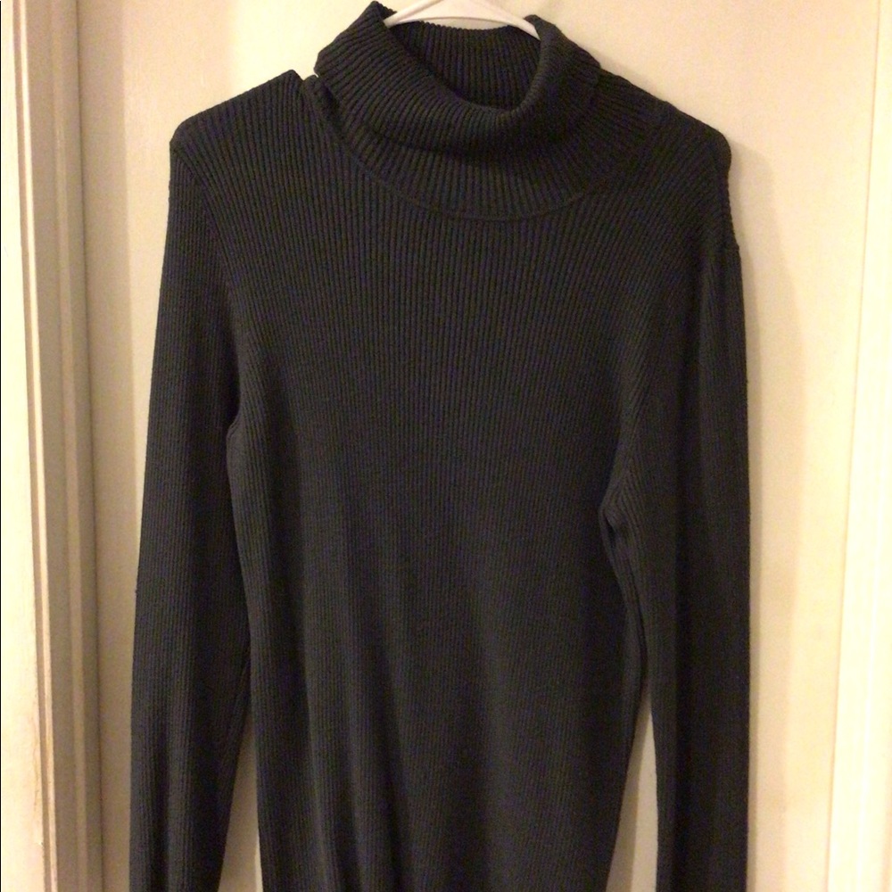 Derek heart plus a gray turtleneck sweater.